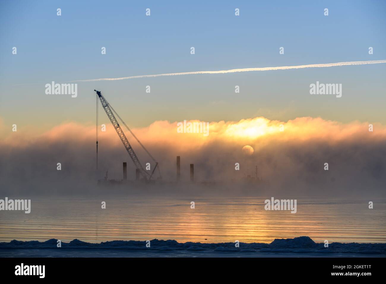 Construction Marine offshore works. Dam building, crane, barge, dredger. Breakwater construction. Stock Photo