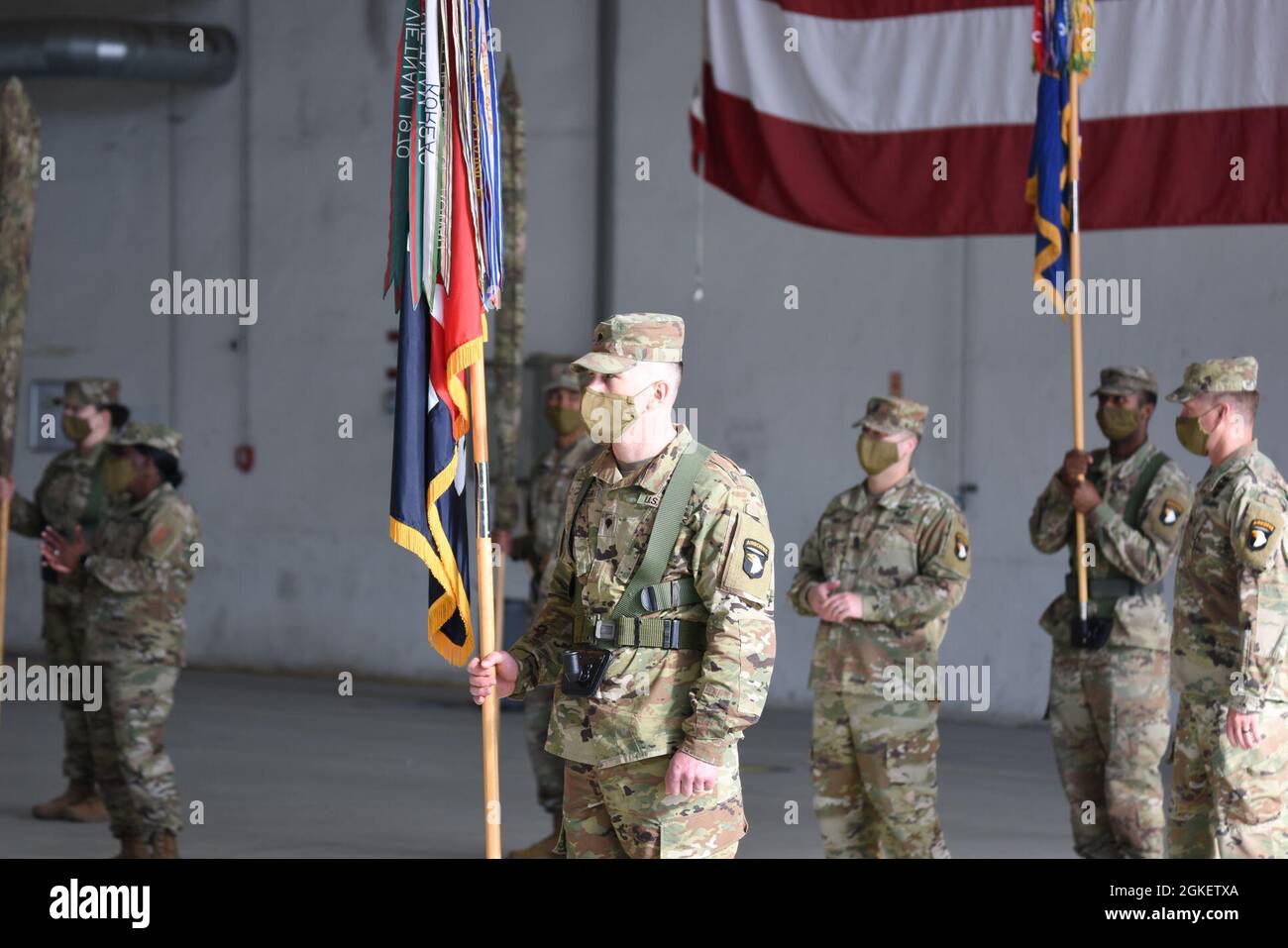 1st Combat Aviation Brigade (1 CAB), 1st Infantry Division, assumes authority from 101st Combat Aviation Brigade (101 CAB), 101st Airborne Division, transfer of authority ceremony April 1, 2021, at Storck Barracks. As the seventh iteration of Atlantic Resolve, the ceremony marked the end of a nine-month rotation for 101st CAB Soldiers out of Fort Campbell, Kentucky, and the 1st Combat Aviation Brigade from Fort Riley, Kansas. Aviation brigades deploy for nine months as a regionally allocated force supporting Atlantic Resolve focusing on strengthening bonds between allies and partners, increasi Stock Photo