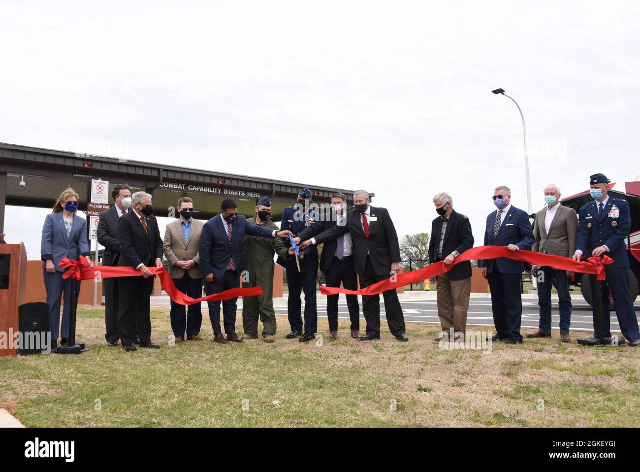 Key leaders from Wichita Falls, Sheppard Air Force Base and the State of Texas cut a ribbon commemorating the completion of the main gate project, April 2, 2021. The nearly $9 million dollar project began in March 2019 and is a statement to the state, local and military partnerships with three different revenue streams contributing to the effort. Stock Photo