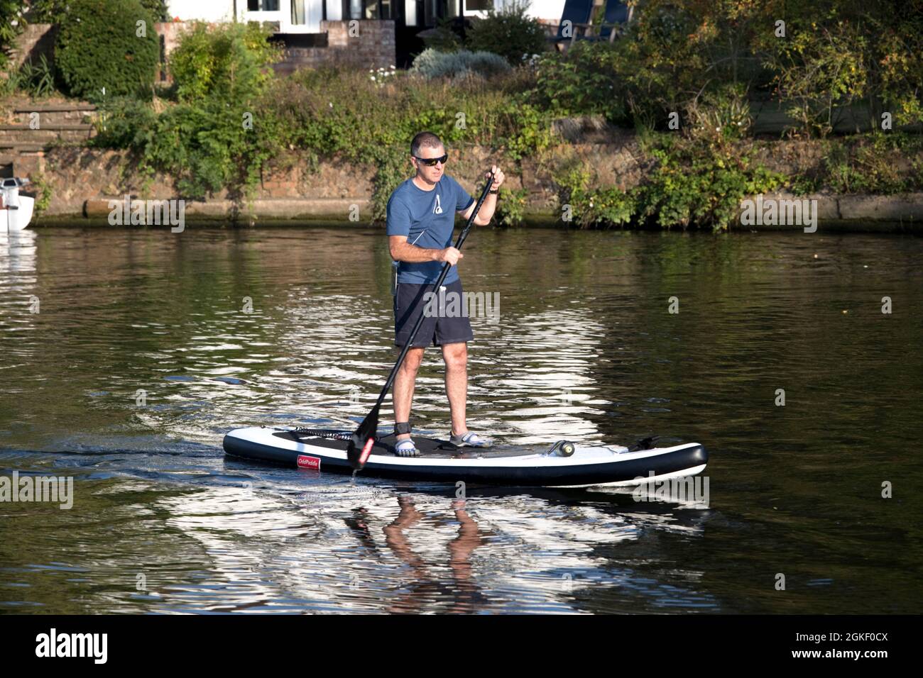 Paddling man hires stock photography and images Alamy