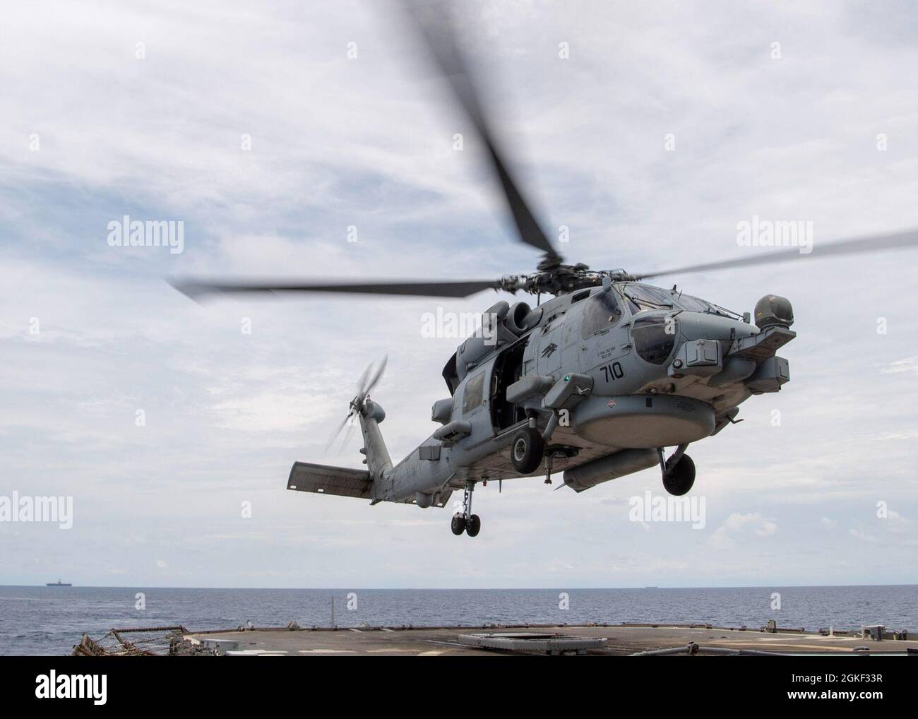 SOUTH CHINA SEA (April 5, 2021) An MH-60R Sea Hawk, assigned to the ...
