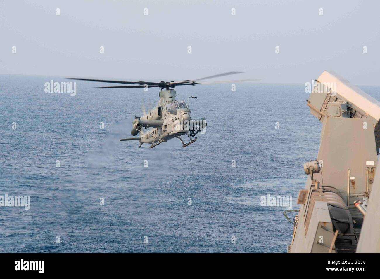 210405-N-JC800-1361   INDIAN OCEAN (April 5, 2021) - A U.S. Marine AH-1Z Super Cobra, assigned to Marine Medium Tiltrotor Squadron 164 (Reinforced), 15th Marine Expeditionary Unit, approaches the flight deck of the amphibious transport dock ship USS Somerset (LPD 25) during La Perouse 2021. Somerset is part of the Makin Island Amphibious Ready Group with embarked 15th Marine Expeditionary Unit operating in the U.S. 7th Fleet area of responsibility. La Perouse is an annual French Navy midshipman deployment called Mission Jeanne d'Arc. The exercise is designed to conduct training, enhance cooper Stock Photo