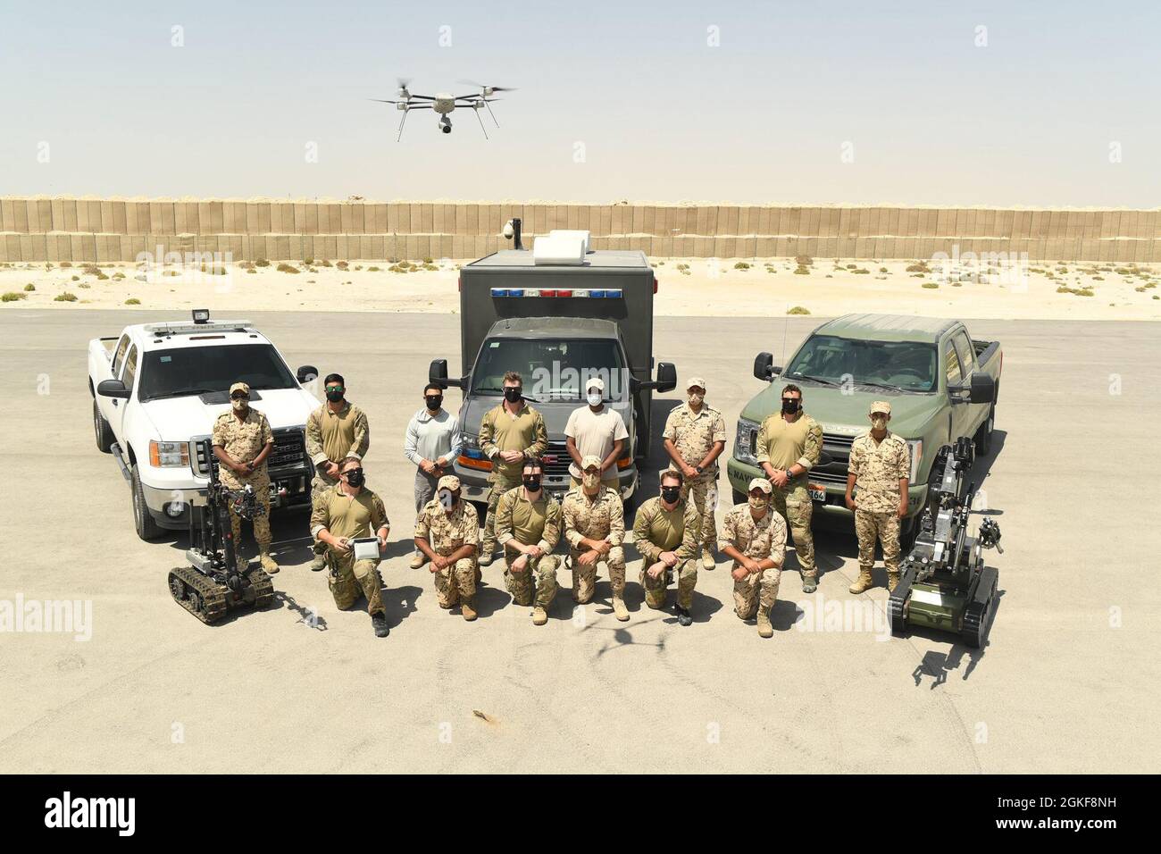 https://c8.alamy.com/comp/2GKF8NH/210407-n-uh865-1143-isa-air-base-bahrain-april-7-2021-us-navy-explosive-ordnance-disposal-eod-technicians-assigned-to-commander-task-force-56-and-bahrain-defense-force-engineers-pose-for-a-group-photo-after-completing-eod-training-during-exercise-neon-defender-21-april-7-neon-defender-21-is-a-bilateral-maritime-exercise-between-the-us-and-bahrain-designed-to-enhance-interoperability-and-readiness-fortify-military-to-military-relationships-and-advance-operational-capabilities-allowing-participating-naval-forces-to-effectively-develop-the-necessary-skills-to-address-threats-to-2GKF8NH.jpg