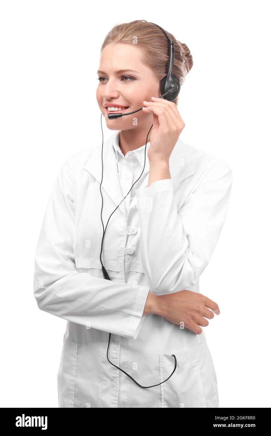 Young female receptionist wearing headset, isolated on white Stock