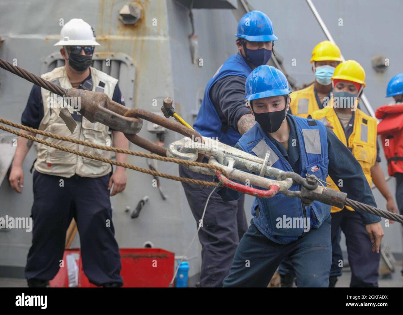 PHILIPPINE SEA (April 7, 2021) Boatswain’s Mate Seaman Billy Reed uses ...
