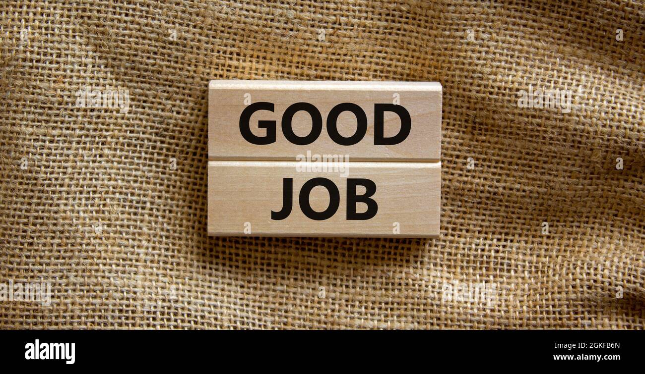 Good job symbol. Concept words 'good job' on wooden blocks on a ...
