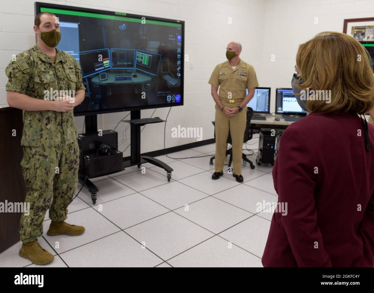 210408-N-XX139-0049 PENSACOLA, Fla. (April 8, 2020) Deputy Secretary of Defense Kathleen H. Hicks participates in a Multipurpose Reconfigurable Training System 3D® (MRTS 3D®) technology training device demonstration and discussion with staff at the Center for Information Warfare Training and Information Warfare Training Command (IWTC) Corry Station. Hicks, along with members of her staff, visited for a familiarization brief and tour of CIWT and IWTC Corry Station onboard Naval Air Station Pensacola Corry Station, Pensacola, Florida. The visit offered an opportunity to update them on CIWT / IWT Stock Photo
