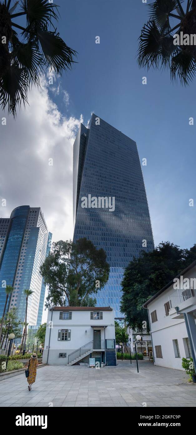 Tel Aviv, Israel - August 19th, 2021:High risers next to renovated old buildings in the Sarona site in Tel Aviv Stock Photo