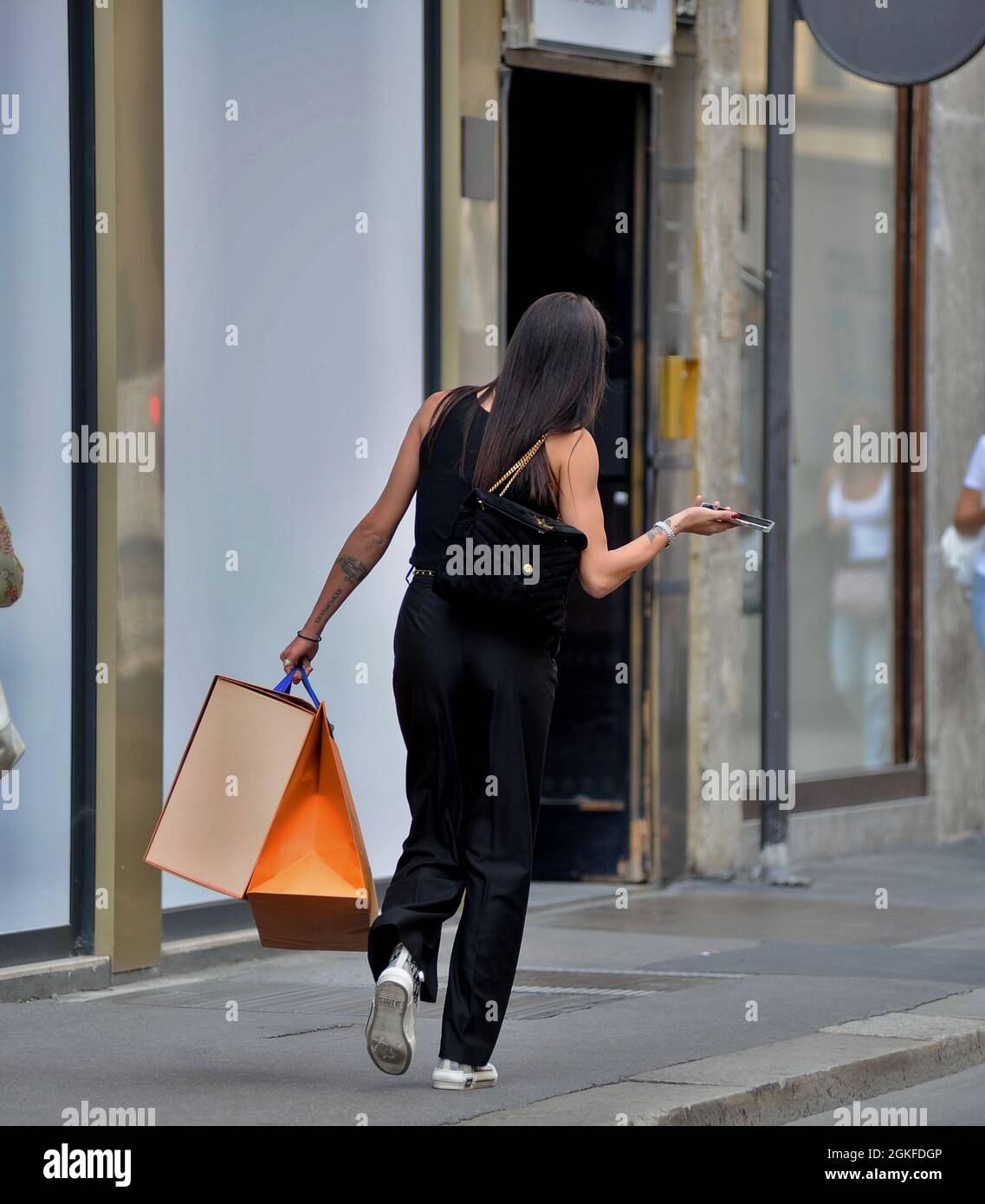 Milan, . 14th Sep, 2021. Milan, 14-9-2021 Carolina Stramare ex Miss Italy  after shopping at Louis Vuitton stops at the Marchesi bar for a coffee  break, then after a walk she decides