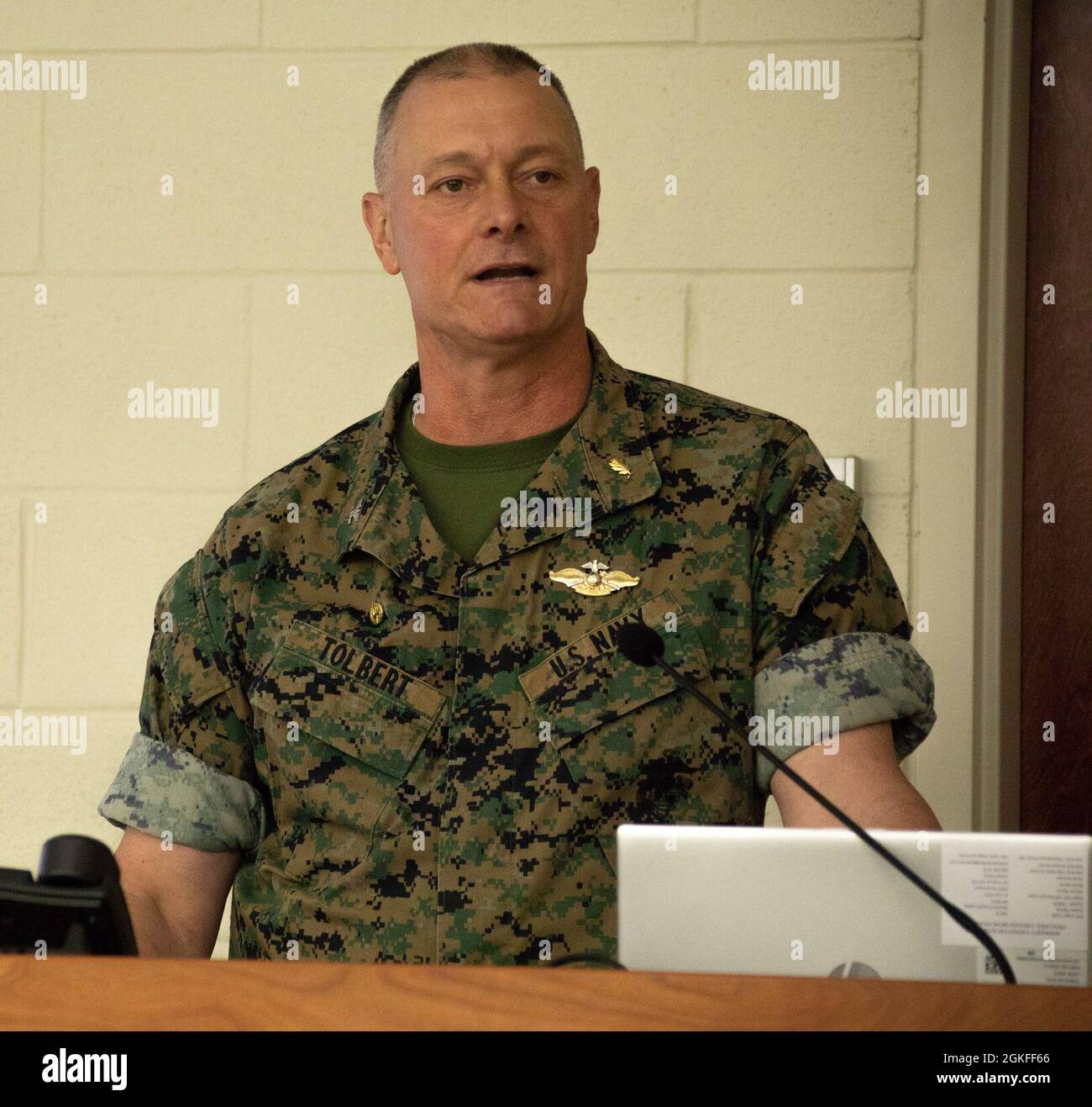 U.S. Navy Capt. Brian Tolbert, Commanding Officer, Field Medical Training Battalion-East (FMTB-E), Marine Corps Combat Service Support Schools, addresses the attendees of the FMTB-E commemoration ceremony at Camp Johnson, N.C., April 8, 2021. The commemoration ceremony honored the 78th anniversary of FMTB-E. Stock Photo