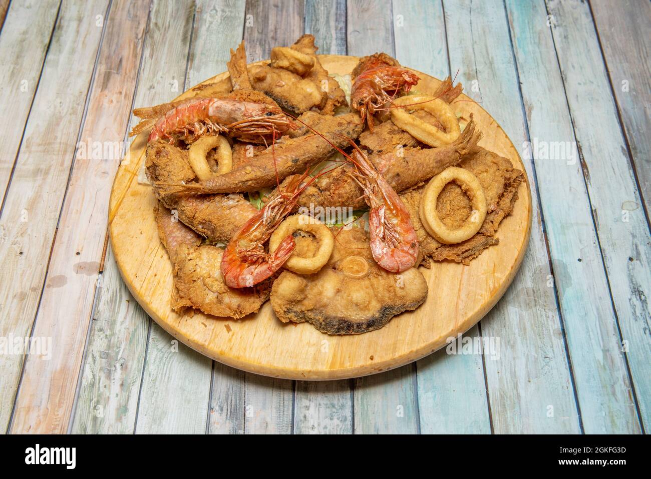 Popular fried fish in batter, grilled shrimp, squid rings, battered red ...