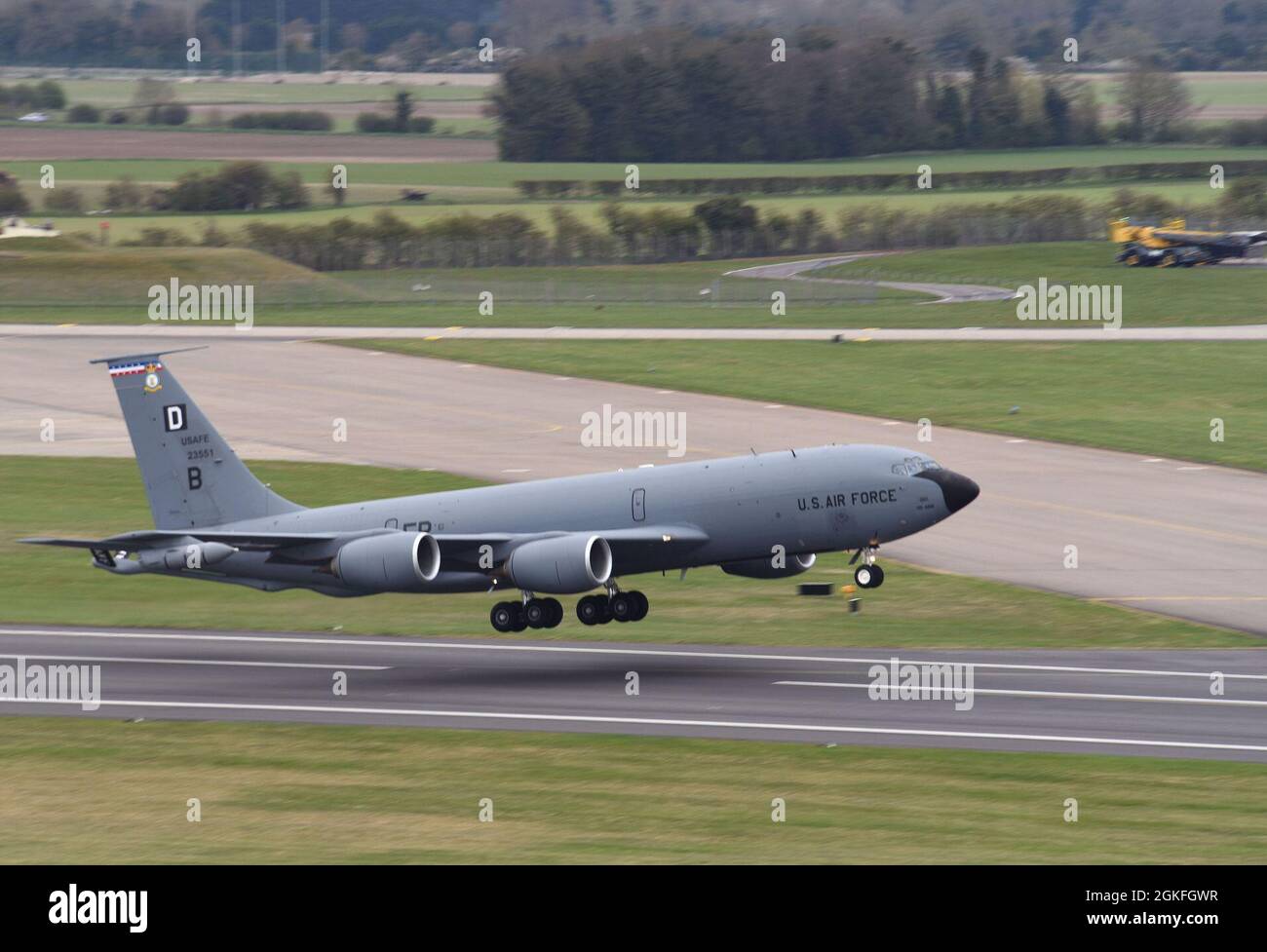 A U.S. Air Force KC-135 Stratotanker assigned to the 100th Air Refueling Wing takes off as it heads out to support exercise INIOCHOS 21 at Royal Air Force Mildenhall, England, April 9, 2021. The event is a Hellenic air force-sponsored operational and tactical-level field training exercise, hosted by the Hellenic Air Tactics Center, Andravida Air Base, Greece. Participation in multinational exercises such as INIOCHOS 21 enhances our professional relationships and improves overall coordination with allies and partner militaries during times of crisis. Stock Photo