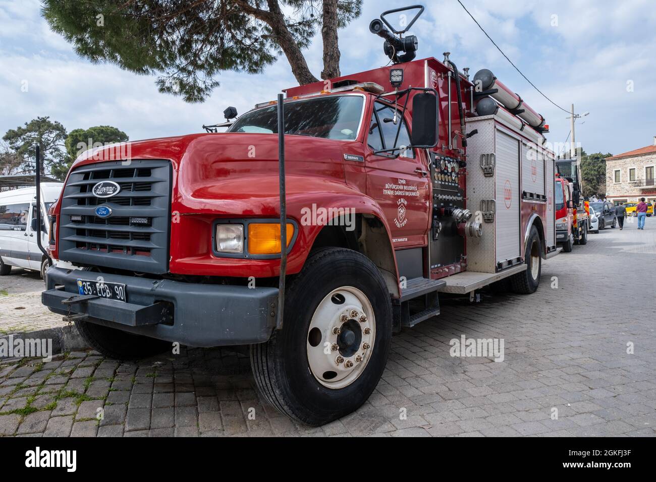Seferihisar, Izmir, Turkey - 03.09.2021: front view of red modern fire brigade truck parked in front of local fire department Stock Photo