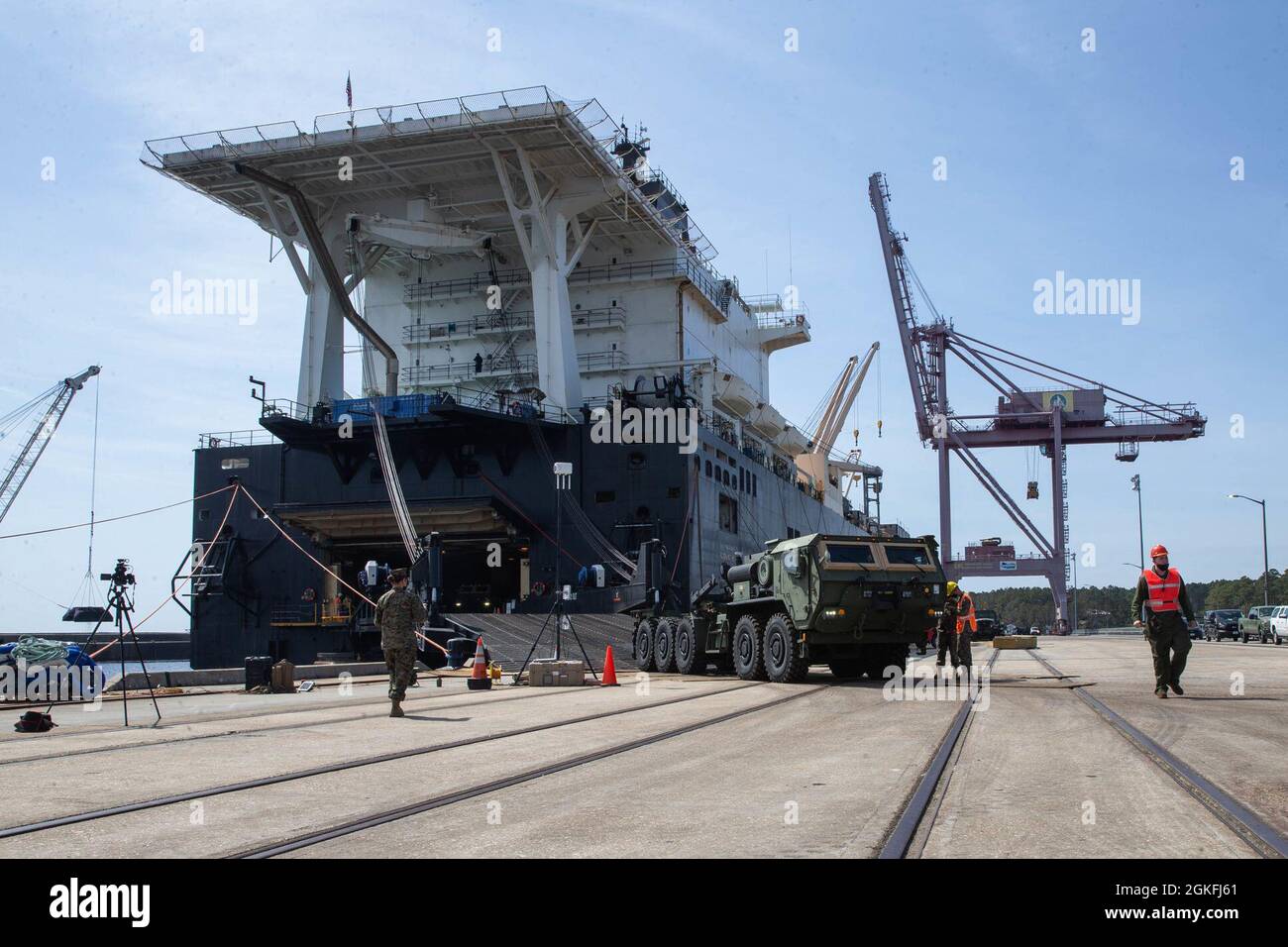 U.S. Marines with II Marine Expeditionary Force offload a medium tactical vehicle replacement from the well deck of the USNS PFC Dewayne T. Williams (T-AK-3009) during exercise Dynamic Cape (DC 21.1) on April 9, 2021 at the Military Ocean Terminal Sunny Point, North Carolina. DC 21.1 is a command and control exercise simulating a contested environment to enhance operational readiness between II Marine Expeditionary Force partner nations and other Department of Defense entities. Stock Photo