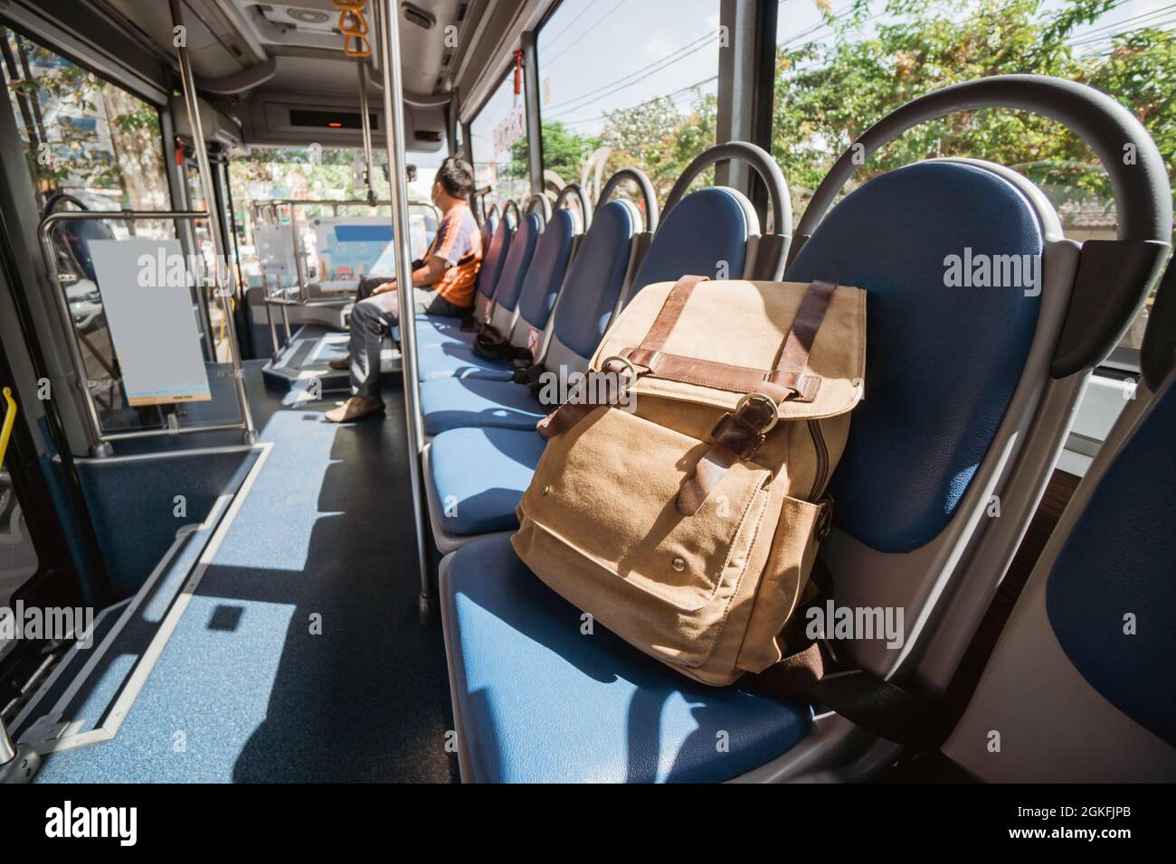 One lost bag or backpack lie on bus seat Stock Photo Alamy