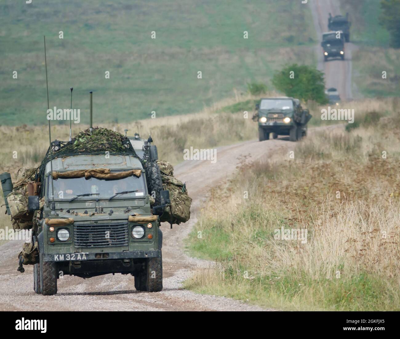 British army Land Rover Wolf 4×4 military medium utility vehicle in action on a military exercise, Salisbury Plain UK Stock Photo