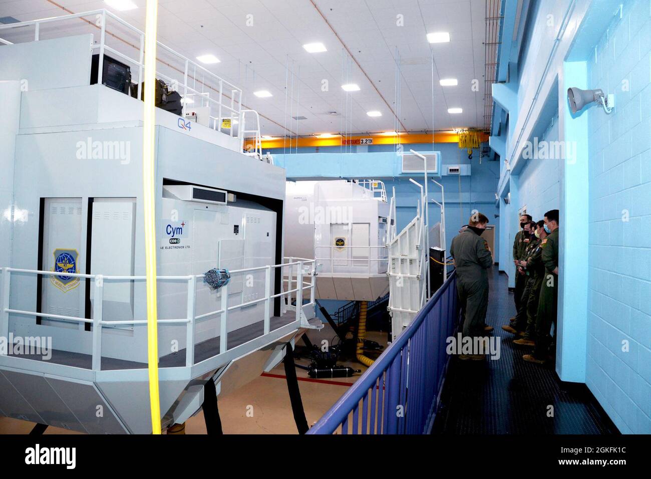 A 4th Air Force A3 team visits the C-5M Super Galaxy simulators at the ...