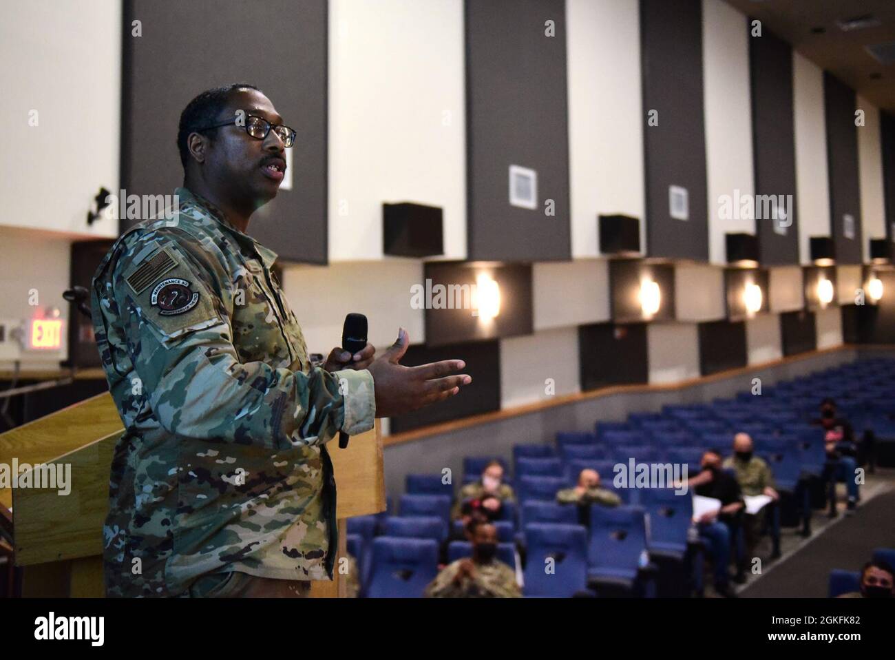 Tech. Sgt. Byron Cole, 8th Maintenance Squadron inspections section chief, briefs about an inner ear bone conducting headset during a Wolf Tank at Kunsan Air Base, Republic of Korea, April 9, 2021. Wing leadership funded three of the five ideas that were presented, which included a wireless intercom system, an inner ear bone conducting headset, and hardened aircraft system GPS repeaters. Stock Photo