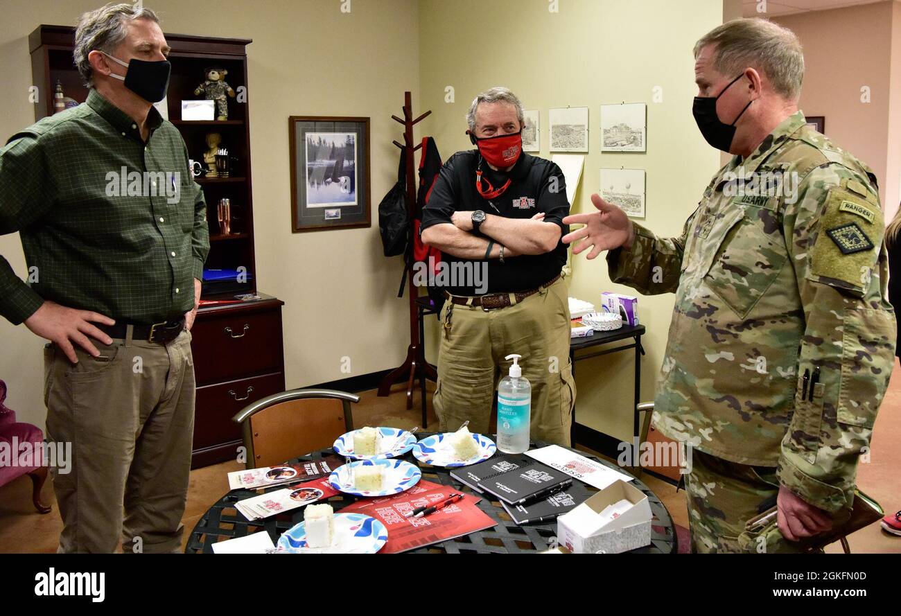 U.S. Representative French Hill (AR) speaks with Mr. Michael Biggs, military transfer coach, and the Adjutant General of the Arkansas National Guard, Maj. Gen. Kendall Penn, at the new Arkansas State University System's Military Transfer Center on the Robinson Maneuver Training Center in North Little Rock, Arkansas on April 10th. Stock Photo