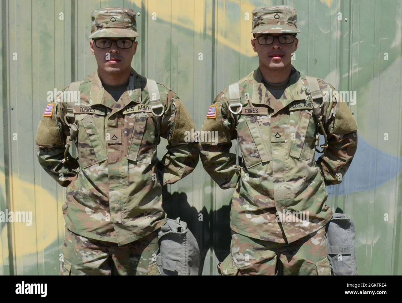 Pfcs. Luis Joel (left) and Luis Javier Torres Perez are twin brothers from Puerto Rico assigned to Company C, 35th Engineer Battalion, for One Station Unit Training here. While they have a family tradition of military service — their father and grandfather each served in the Army — the siblings decided to join the Army together after seeing the support National Guard Soldiers provided after the Category 5 Hurricane Maria 'destroyed our island' in September 2017. Stock Photo