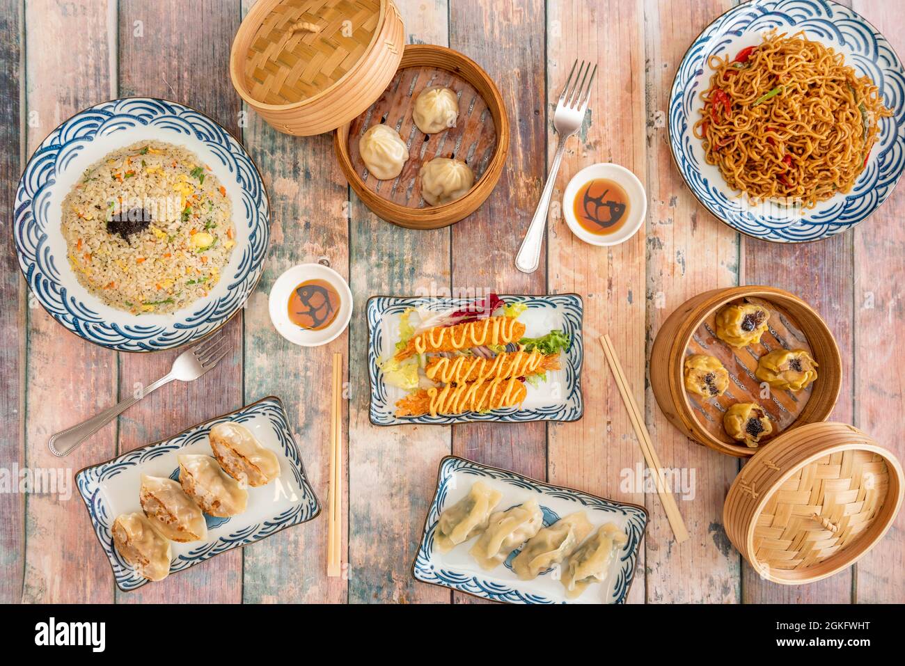 Asian and Chinese popular food dishes. Prawns in tempura, varied dim