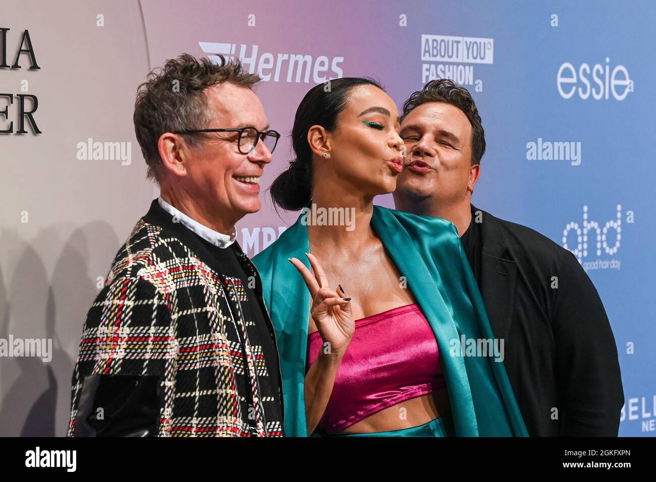 Berlin, Germany. 14th Sep, 2021. Frank Mutters (l-r), Verona Pooth and Guido Maria Kretschmer arrive at the Guido Maria Kretschmer Show at Kraftwerk. About You, or Re-Fashion Week, has been part of Berlin Fashion Week since 2021. About You Fashion Week runs from 11 to 15 September 2021. Credit: Jens Kalaene/dpa/Alamy Live News Stock Photo