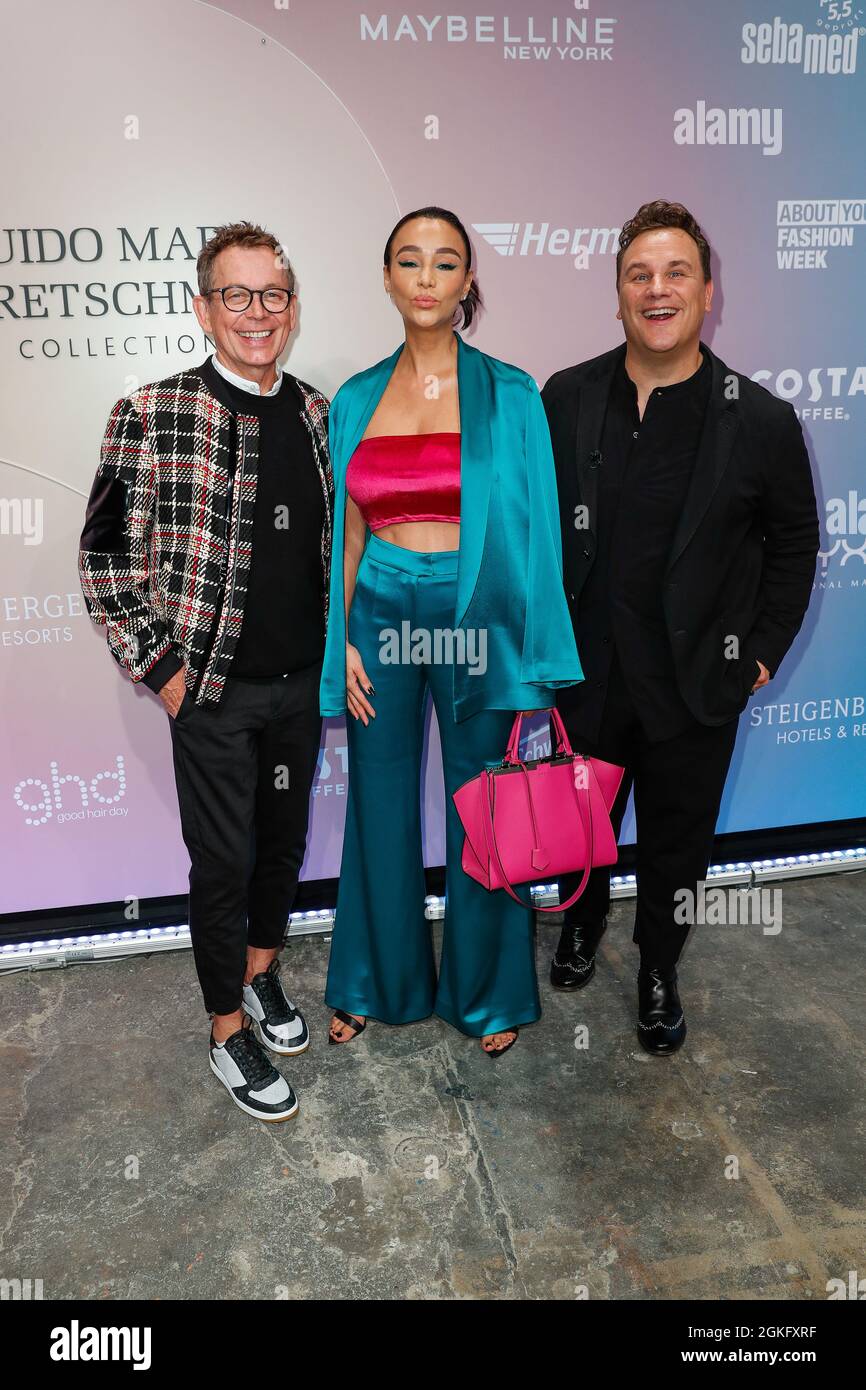 Berlin, Germany. 14th Sep, 2021. Frank Mutters (l-r), Verona Pooth and Guido Maria Kretschmer arrive at the Guido Maria Kretschmer Show at Kraftwerk. About You, or Re-Fashion Week, has been part of Berlin Fashion Week since 2021. About You Fashion Week runs from 11 to 15 September 2021. Credit: Gerald Matzka/dpa/Alamy Live News Stock Photo