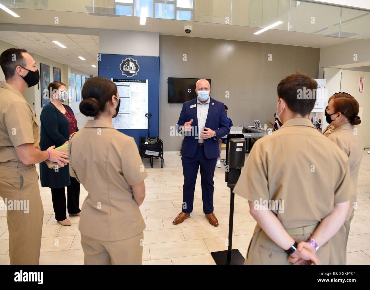 SAN ANTONIO – (April 12, 2021) Dr. Edwin Blanton, executive director of the Mays Center, welcomes Naval officers during a Navy Promotional Day (NPD) held on the campus of Texas A&M University-San Antonio. An NPD is a proprietary recruitment program built specifically for the purpose of attracting the brightest, diverse college prospects, and showcasing opportunities for both military and civilian careers. The purpose of a NPD is to build and sustain strategic networks with high schools, universities and colleges. Its goal is to promote Navy Awareness within diverse and under-represented commun Stock Photo