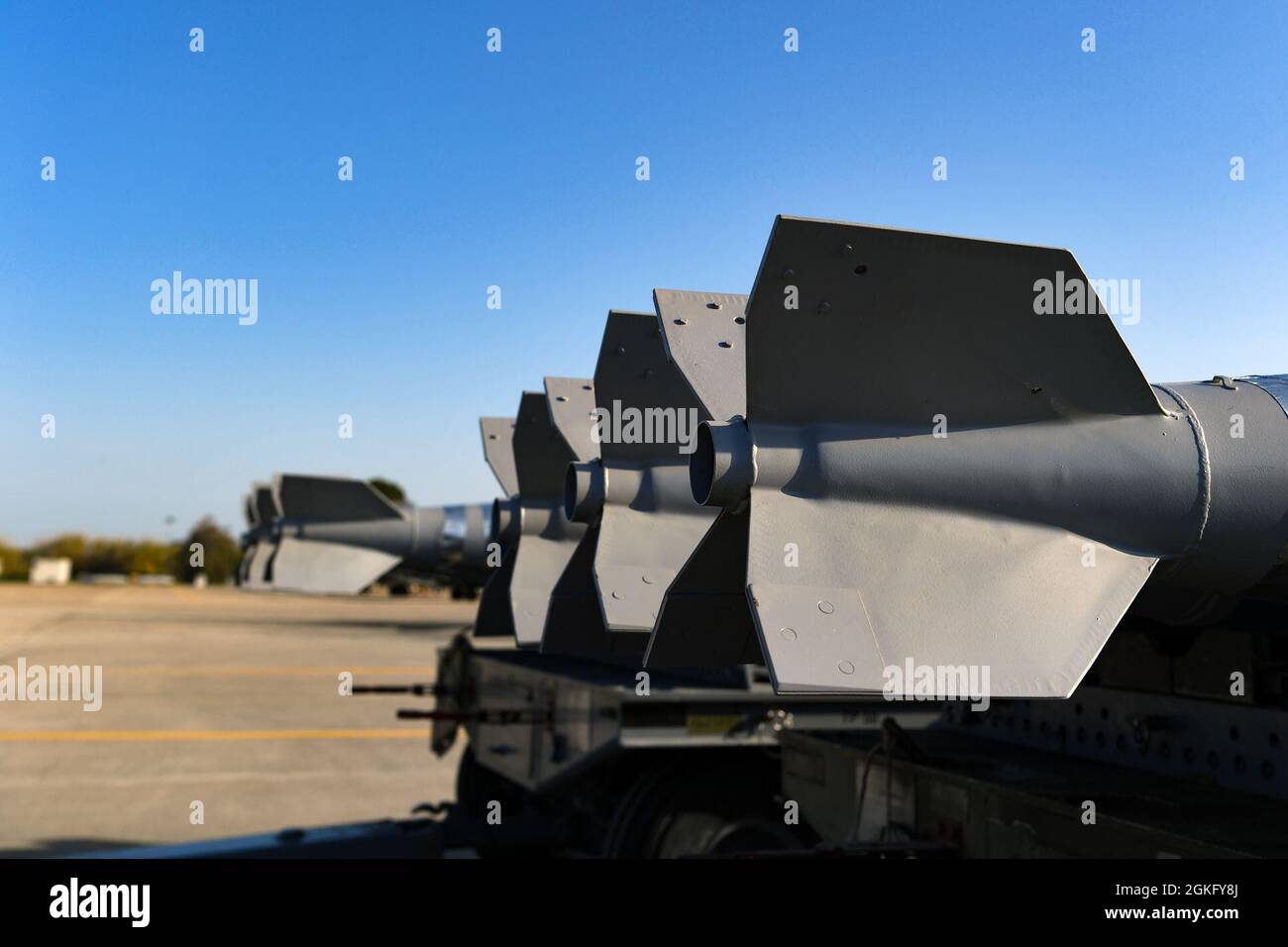 Inert munitions provided by the 31st Munitions Squadron (MUNS) sit on a trailer at Andravida Air Base, Greece, April 12, 2021. The inert munitions were used for INIOCHOS 21, a Hellenic Air Force-led, large force flying exercise focused on strengthening partnerships and interoperability. Stock Photo