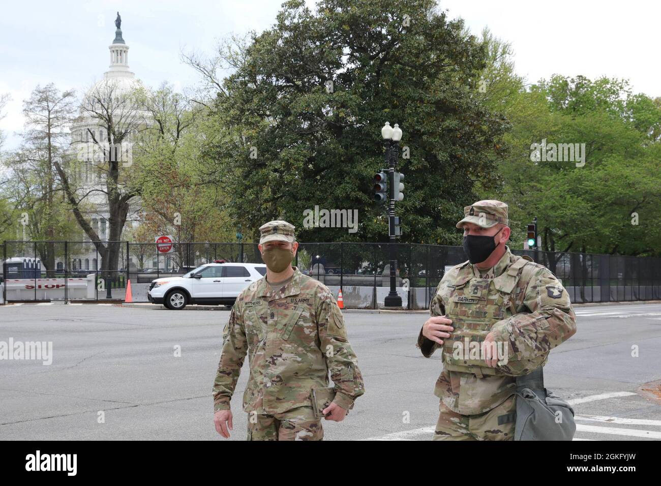 U.S. Army Command Sgt. Maj. Jesse Withers, left, state command sergeant major, Kentucky National Guard, and Master Sgt. Joshua Barker, acting first sergeant of Task Force Legion, 101st Main Command Post Operational Detachment, patrol near the U.S. Capitol in Washington, D.C., April 12, 2021. The National Guard has been requested to continue supporting federal law enforcement agencies with security, communications, medical evacuation, logistics, and safety support to state, district and federal agencies through mid-May. Stock Photo