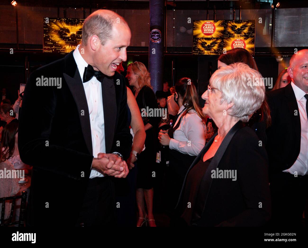The Duke of Cambridge speaks with Sandra Georgina West (David Beckham's mother) at The Sun's Who