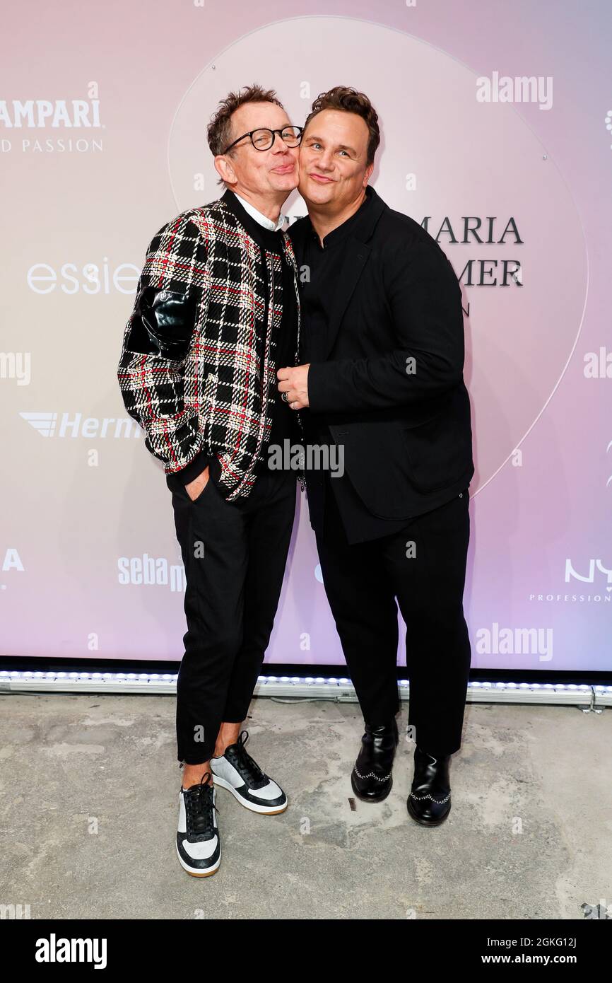 Berlin, Germany. 14th Sep, 2021. Frank Mutters (l) and husband Guido Maria  Kretschmer arrive at the Guido Maria Kretschmer show at Kraftwerk. About  You, or Re-Fashion Week, has been part of Berlin