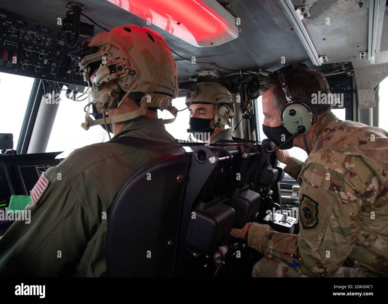 SASEBO, Japan (April 14, 2021) – U.S. Forces Japan Lt. Gen. Kevin Schneider receives a demonstration flight of a landing craft, air cushion (LCAC) from Chief Aviation Machinist’s Mate Anthony Theel, assigned to Naval Beach Unit Seven, onboard Commander, Fleet Activities Sasebo April 14, 2021. Schneider visited Sasebo to review CFAS’ contributions to U.S. Forces Japan’s mission and meet with local U.S. Navy leaders and Japan Self-Defense Force partners to reaffirm the U.S.-Japan alliance. Stock Photo