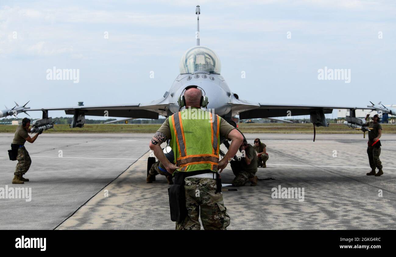 F-16 Fighting Falcon maintainers with the 140th Wing, conduct pre flight checks during Sentry Savannah 2021 in Savannah, Georgia. More than 10 units and over 60 aircraft are participating in Sentry Savannah 2021, the Air National Guard’s largest air-to-air, 4th and 5th generation fighter exercise, to showcase the nation's combat aircraft readiness. Stock Photo