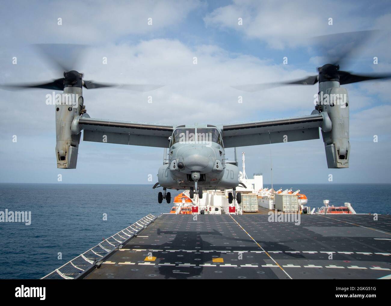 210414-N-DA693-1385  PACIFIC OCEAN (Apr. 14, 2021) An MV-22B Osprey assigned to Air Test and Evaluation (HX) Squadron 21 of Naval Air Station (NAS) Patuxent River, Md., takes off from Military Sealift Command hospital ship USNS Mercy’s (T-AH 19) flight deck Apr. 14. Mercy is underway off the coast of Southern California completing Dynamic Interface testing, where the ship’s aviation facilities will be evaluated for compatibility with the V-22 Osprey and MH-60 Seahawk, and establish launch and recovery windows in adverse weather conditions. Mercy recently returned to its homeport in San Diego f Stock Photo