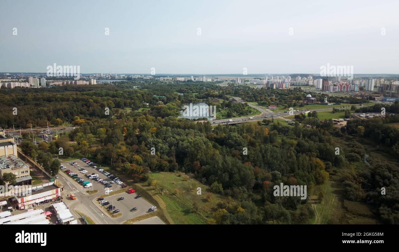An overpass across the city river. Busy freeway. Aerial photography. Stock Photo