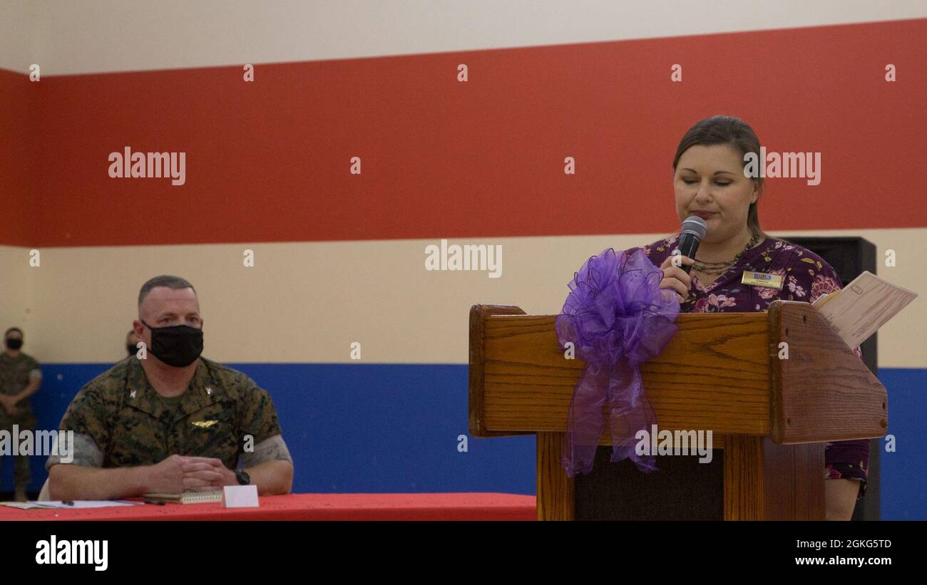 Candice Brown, the school liaison officer for Marine Corps Air Station (MCAS) Yuma, addresses military children at the Youth Center on MCAS Yuma, Ariz., April 14, 2021. The ceremony was held to honor military children by highlighting their unique experiences. Stock Photo