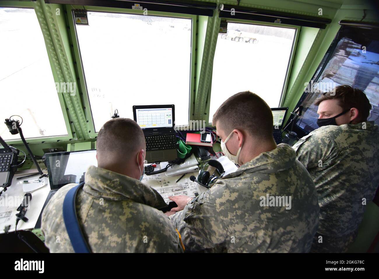 Air traffic control personnel (left to right) Spc. Chase Pattison, Sgt ...