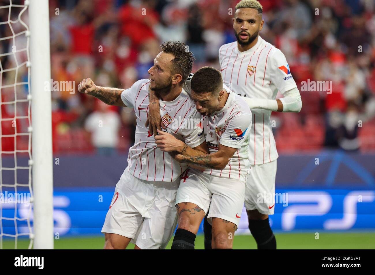 Seville, Seville, Spain. 14th Sep, 2021. Ivan Rakitic of Sevilla CF  celebrates a goal with Papu Gomez of Sevilla CF during the UEFA Champions  League Group G stage match between Sevilla FC