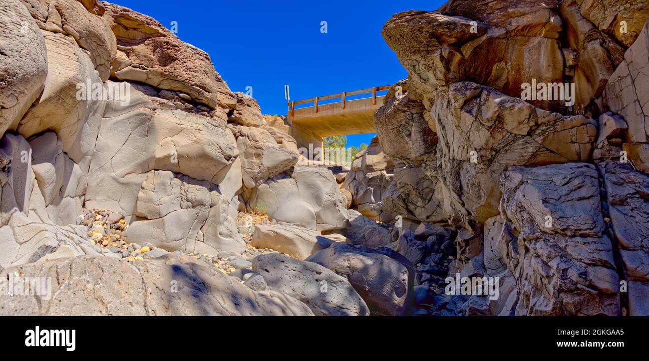 View of a shallow canyon near Perkinsville Arizona from beneath a bridge. The canyon has no official name on the map but I call it Gray Stone Canyon b Stock Photo