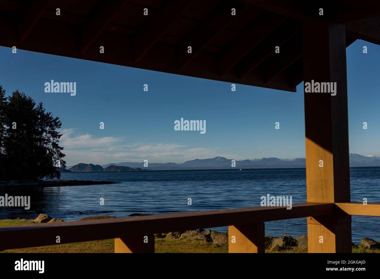 View of (and through) the Kinsmen Pavillion looking at Hardy Bay in Port Hardy, with Broughton archipelago in distance, Vancouver Island, BC, Canada Stock Photo