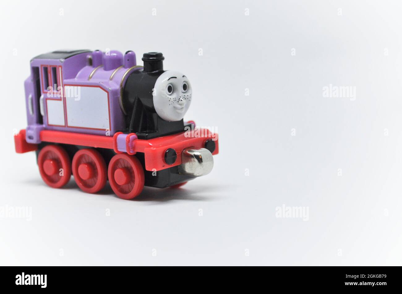 Die cast model of Rosie from Thomas the Tank Engine  set against a white background. Copy space is available Stock Photo
