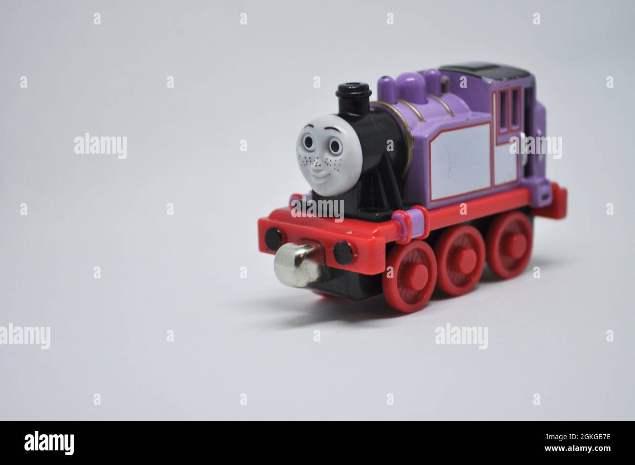 Die cast model of Rosie from Thomas the Tank Engine  set against a white background. Copy space is available Stock Photo