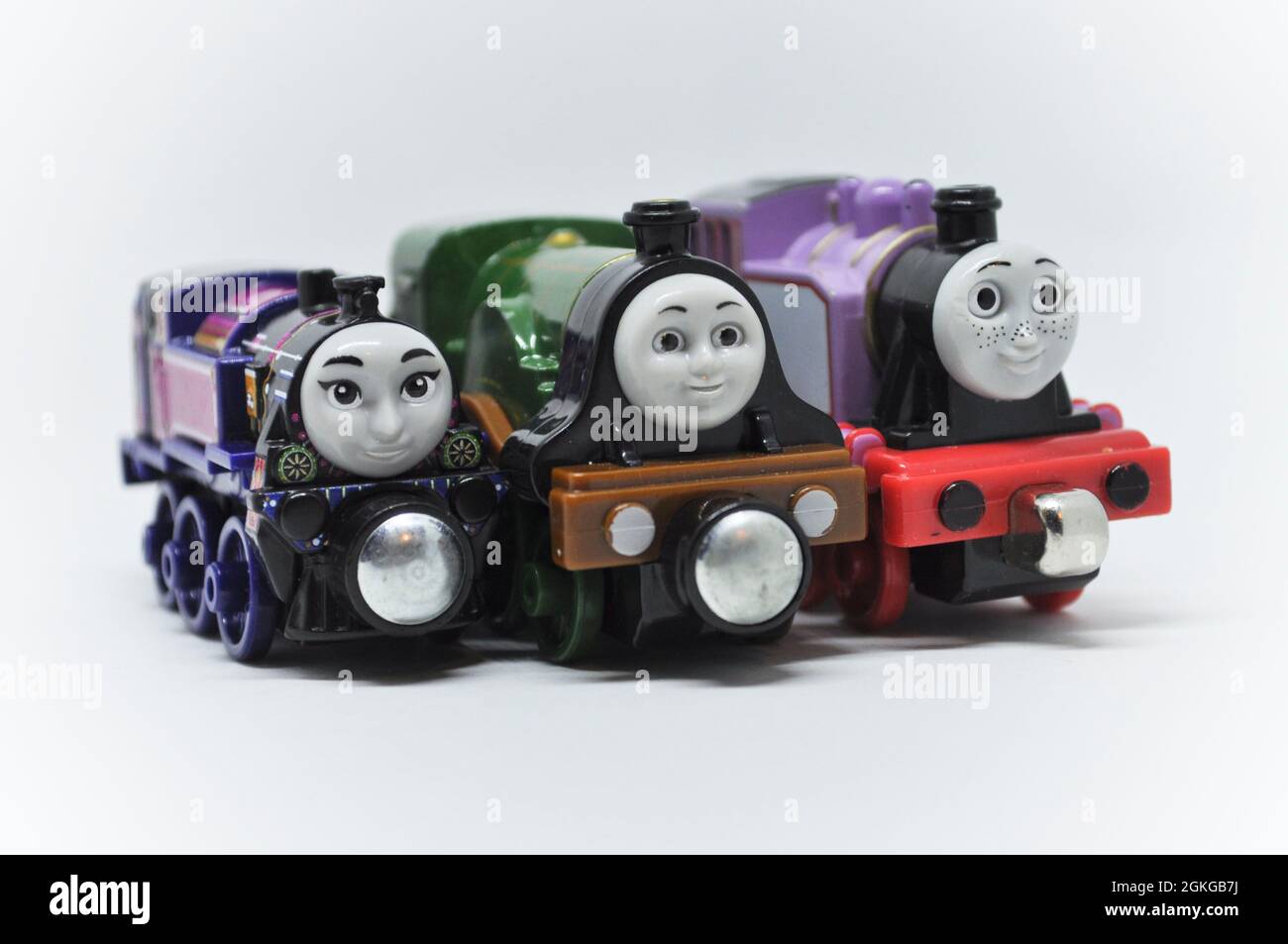 Three strong female engines from Thomas the tank engine series set against a white background. Stock Photo