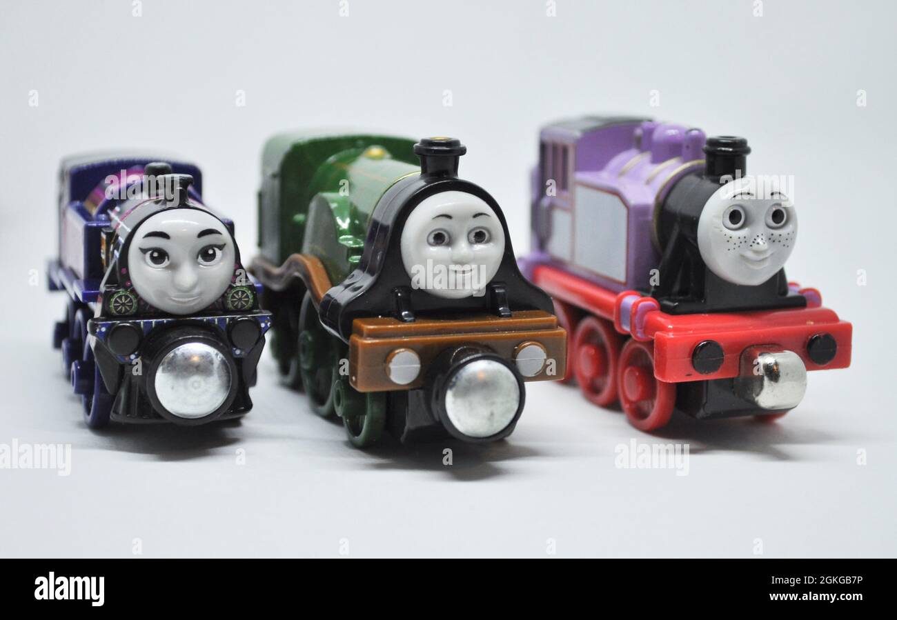 Three strong female engines from Thomas the tank engine series  set against a white background. Stock Photo