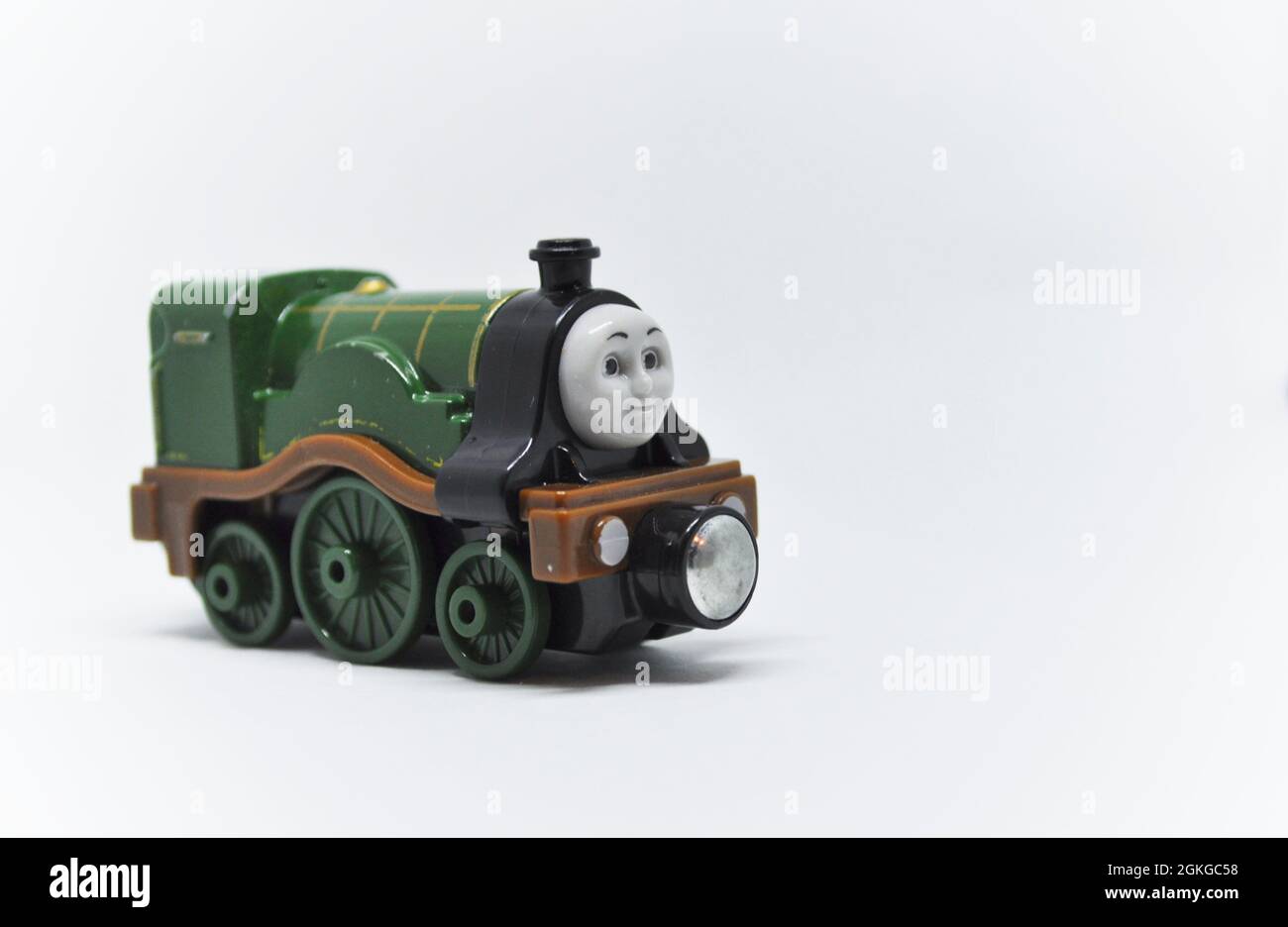 Die cast model of Emily from Thomas the Tank Engine set against a white backgroud. Copy space is available Stock Photo