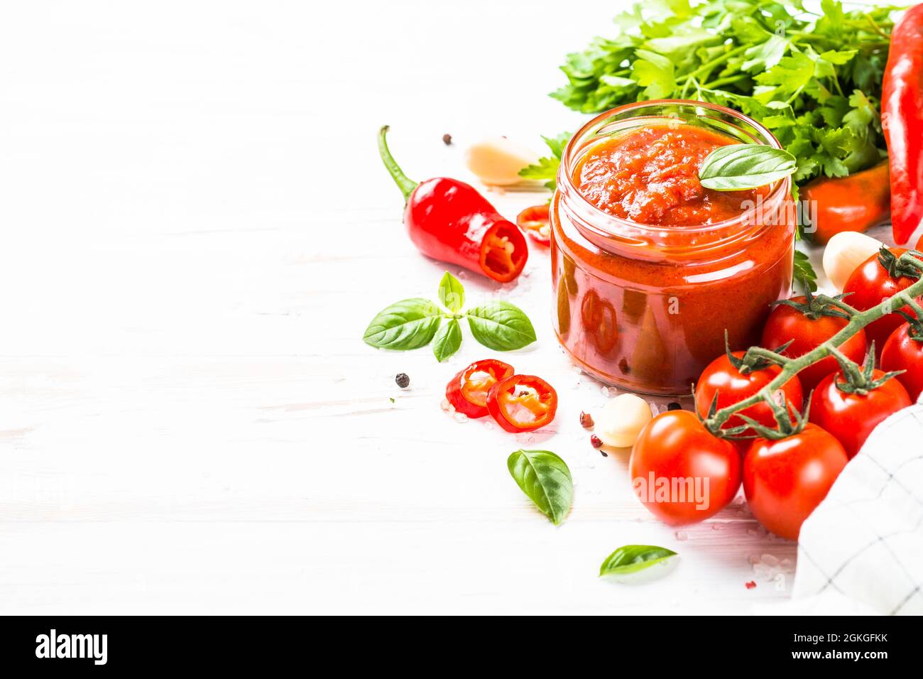 Tomato sauce with herbs and spices at white background Stock Photo Alamy