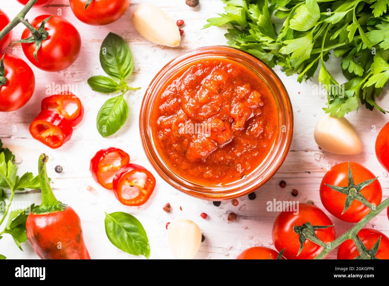 Tomato sauce with herbs and spices at white background Stock Photo Alamy