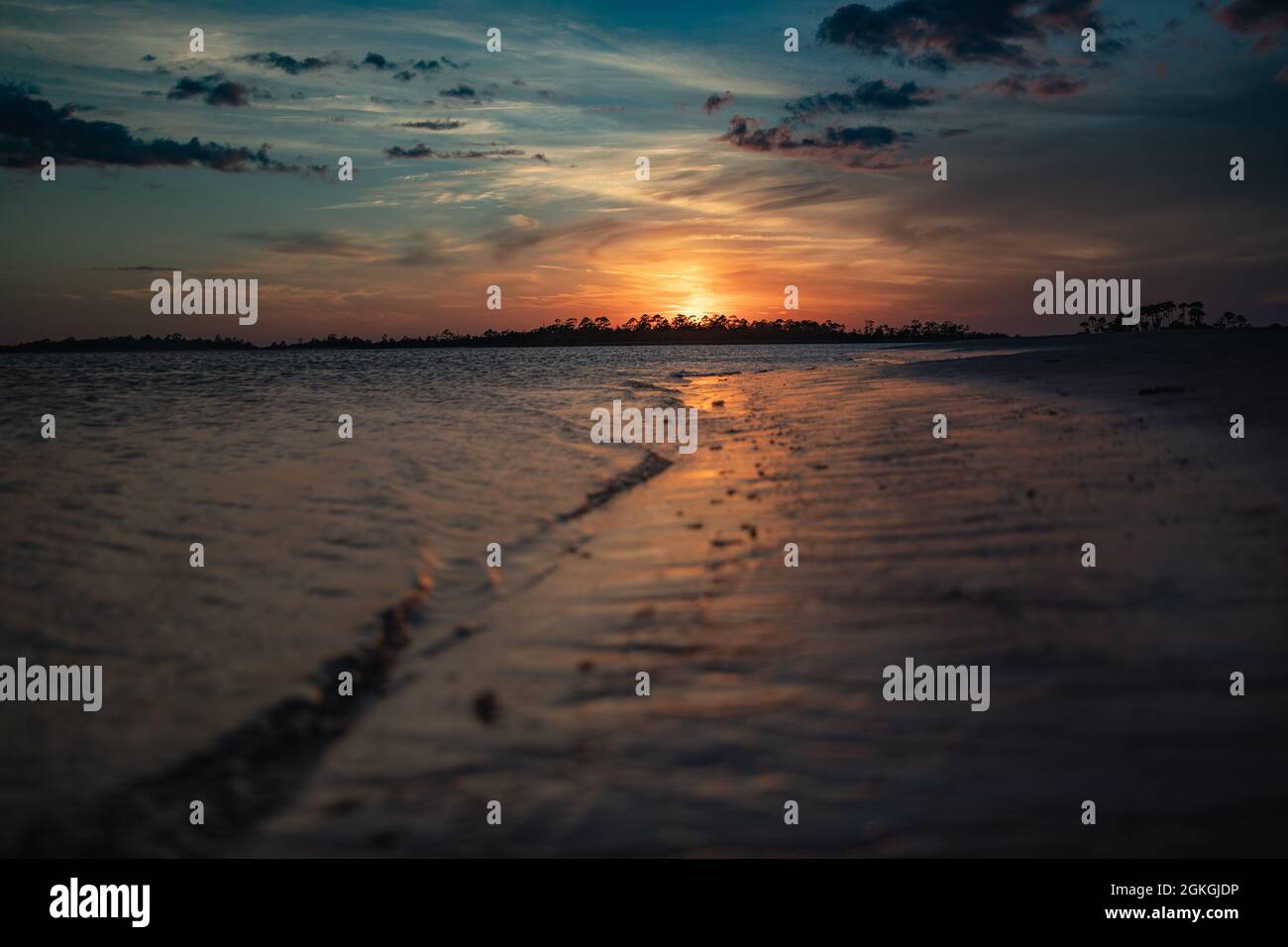 A sunset at Tybee Island, Georgia during the summer, with the view