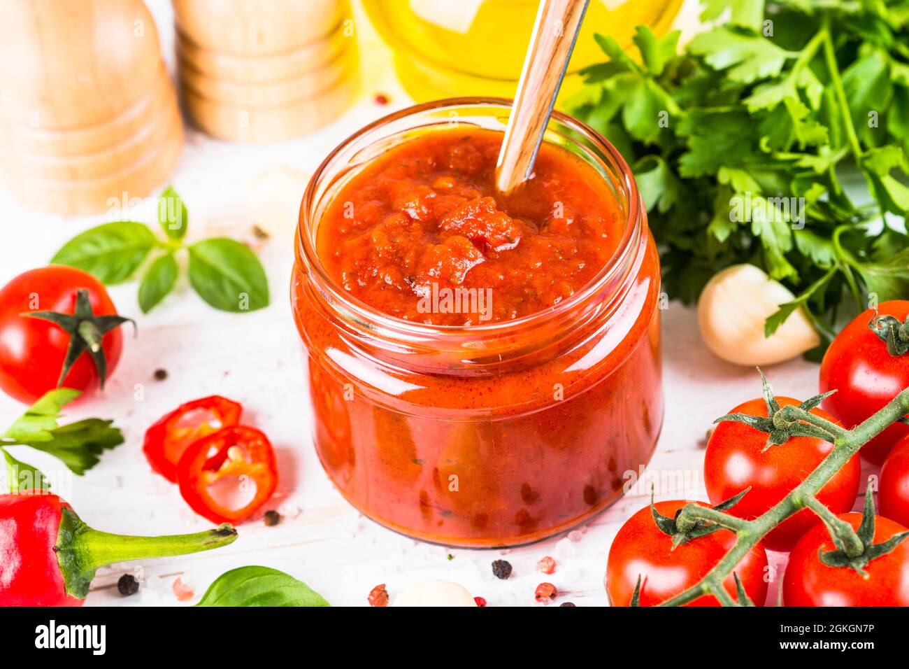 Tomato sauce with herbs and spices at white background Stock Photo Alamy